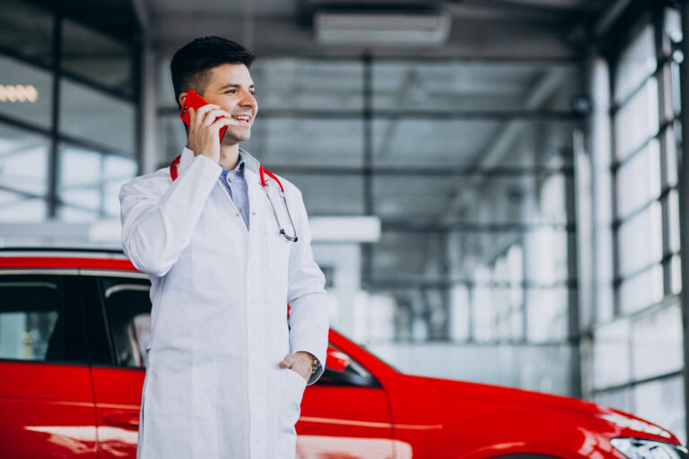 car technician with stethoscope car showroom talking phone